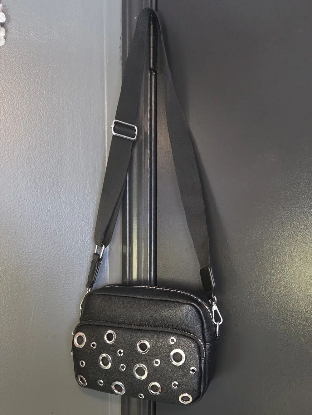 Metal Grommet Handbag